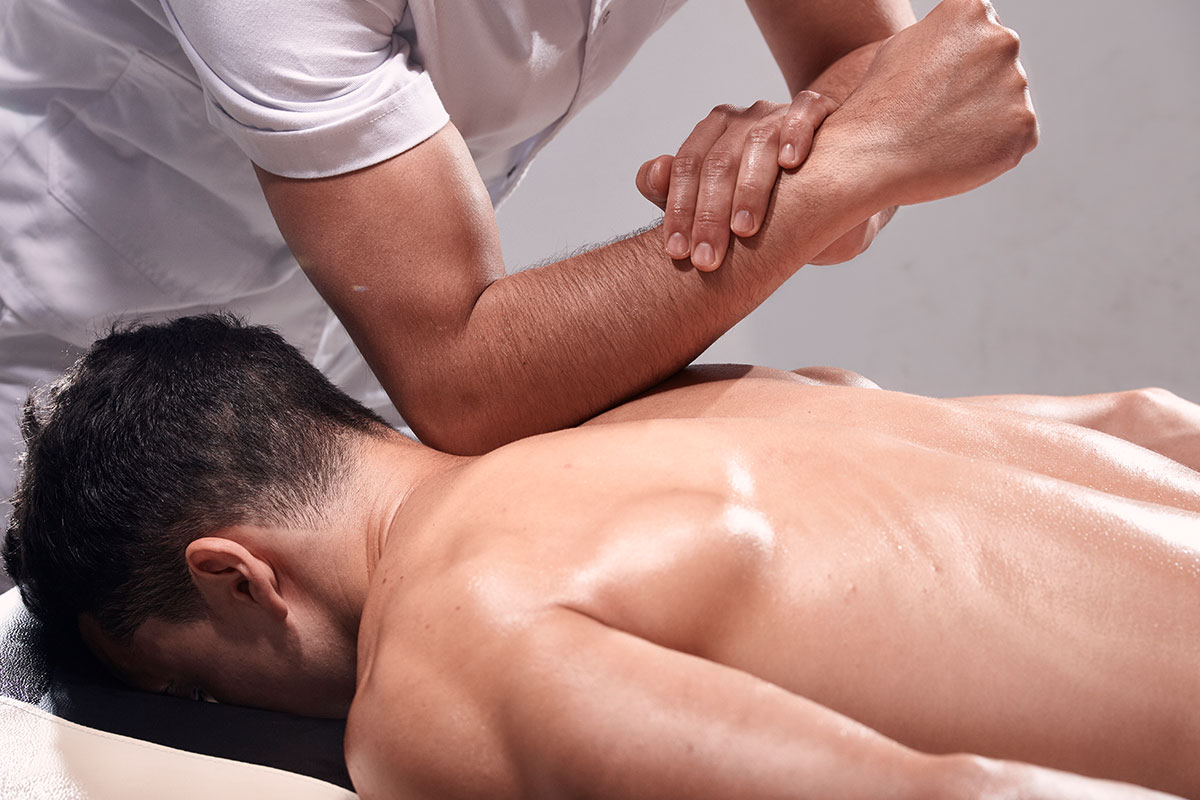 Deep tissue massage on shoulders
